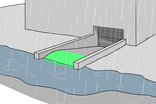 Eine Kuppe oder Schwelle schützt die Garageneinfahrt vor Hochwasser.